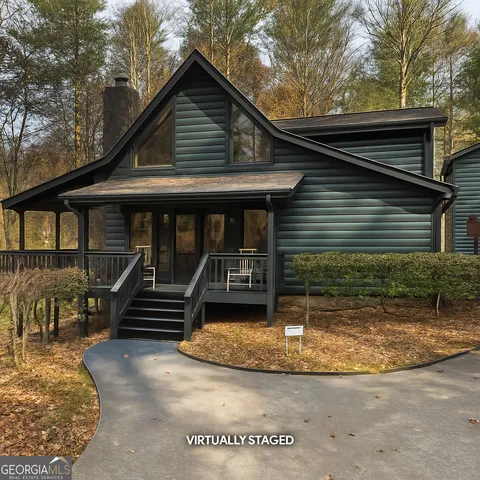 a view of a house with sitting area