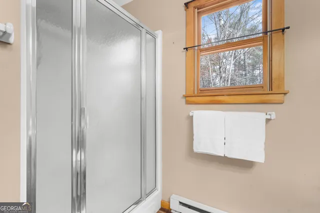 a bedroom with a bed and a walk in closet