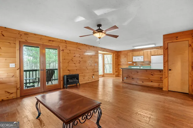 a view of a yard with large trees