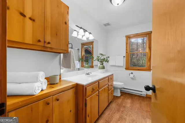 a view of balcony with wooden floor