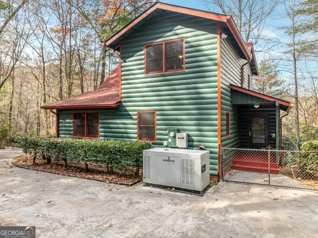 a view of a yard with trees
