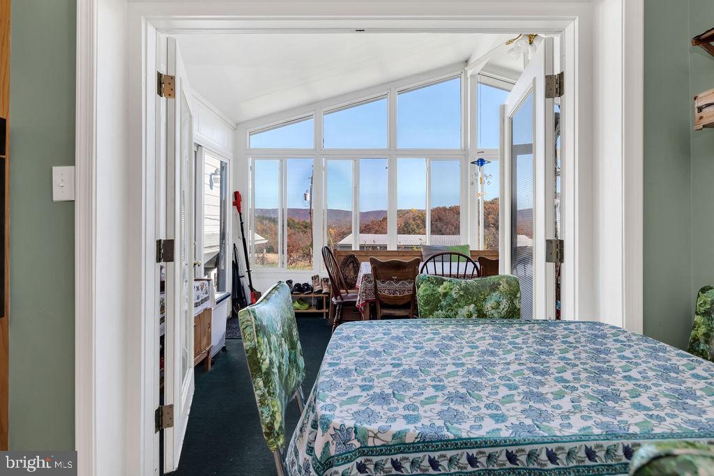 237 Henry O Michael Road Berkeley Springs, WV 25411 - Photo 11 of 37 Sunroom