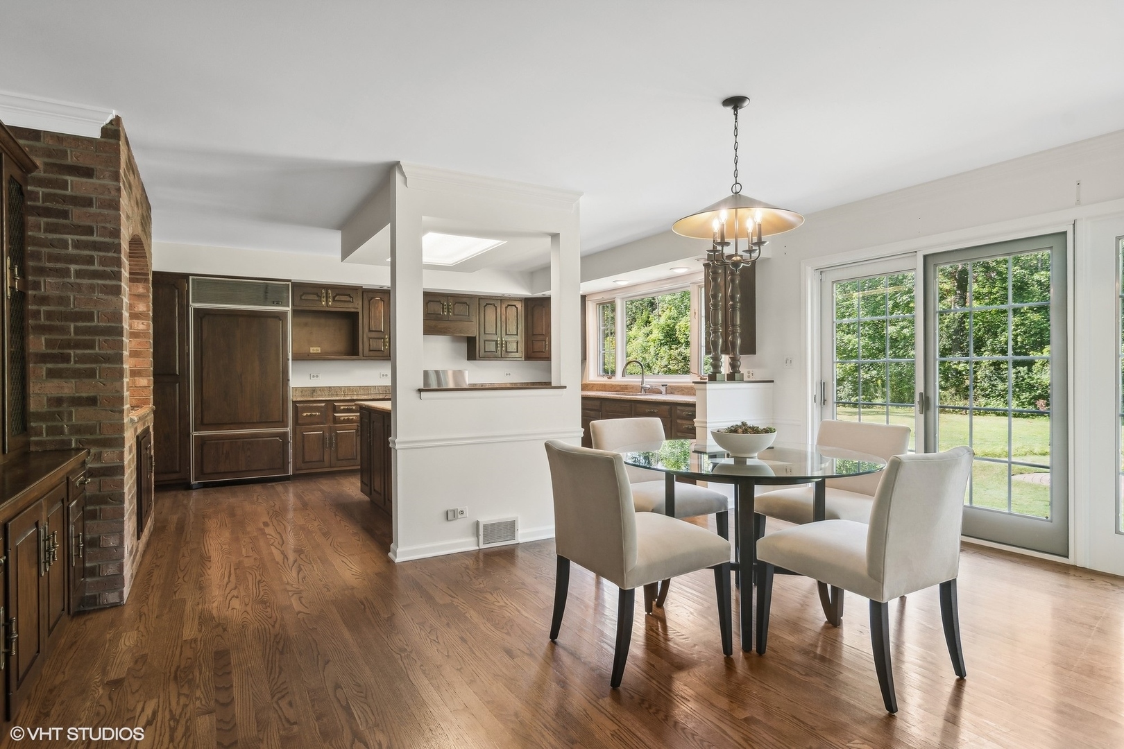 508 Forest Cove Road Lake Bluff, IL 60044 - Photo 13 of 38 a view of a dining room with furniture window and wooden floor