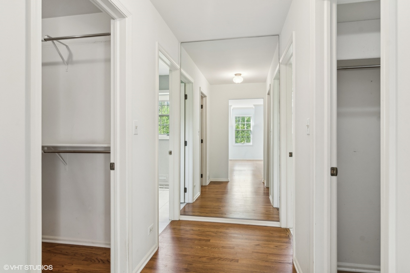508 Forest Cove Road Lake Bluff, IL 60044 - Photo 24 of 38 a view of a hallway with wooden floor and staircase