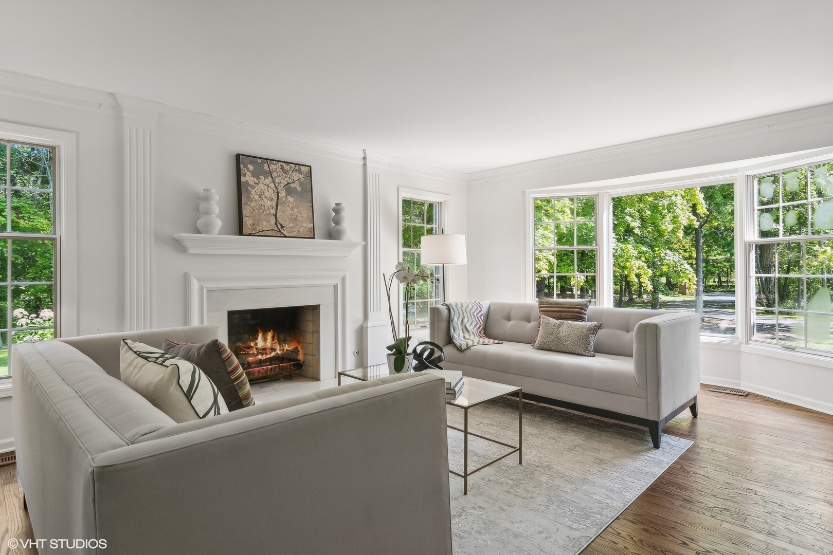 508 Forest Cove Road Lake Bluff, IL 60044 - Photo 6 of 38 a living room with furniture and a fireplace