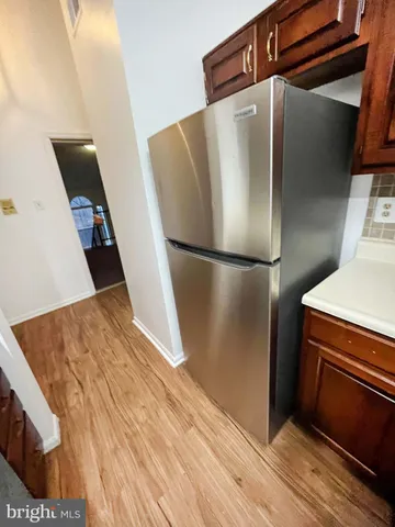 a kitchen with a stove and a microwave