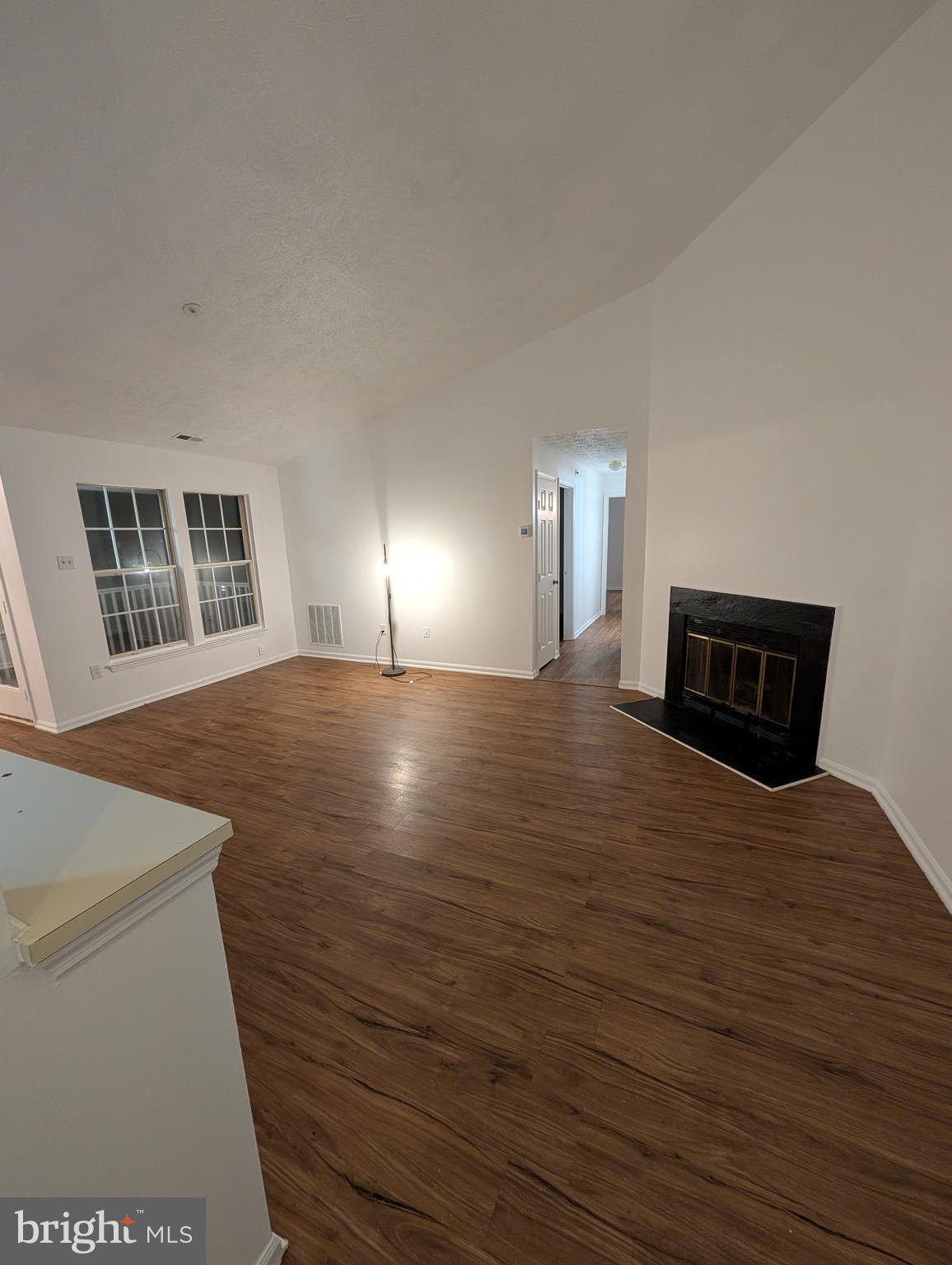 1301 L Cedar Crest Court, Unit 1301L Edgewood, MD 21040 - Photo 23 of 43 a bedroom with a bed and a night stand