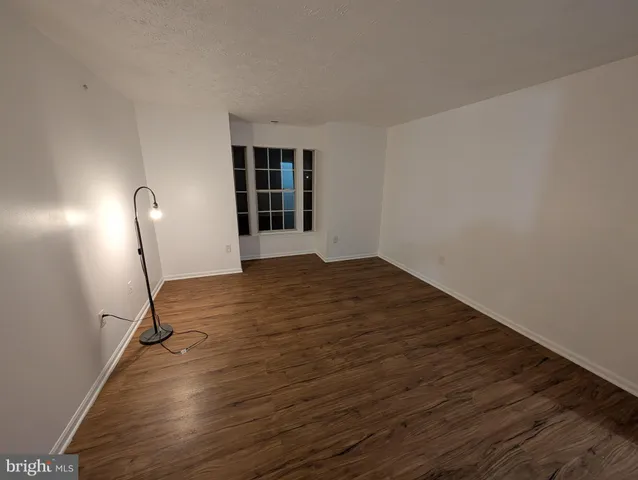 a view of empty room with a window