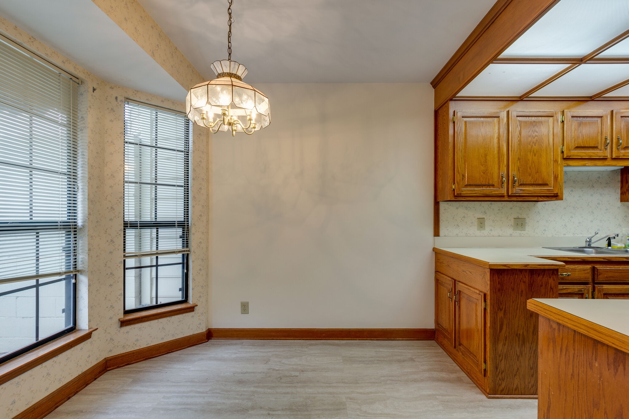 712 General George Patton Road Nashville, TN 37221 - Photo 15 of 35 a view of kitchen with granite countertop cabinets and window