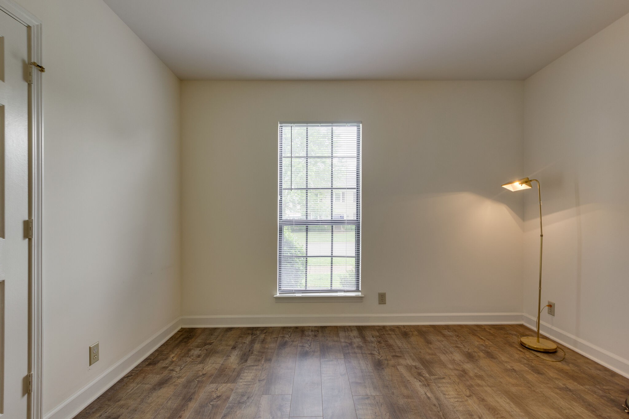 712 General George Patton Road Nashville, TN 37221 - Photo 21 of 35 an empty room with wooden floor and windows