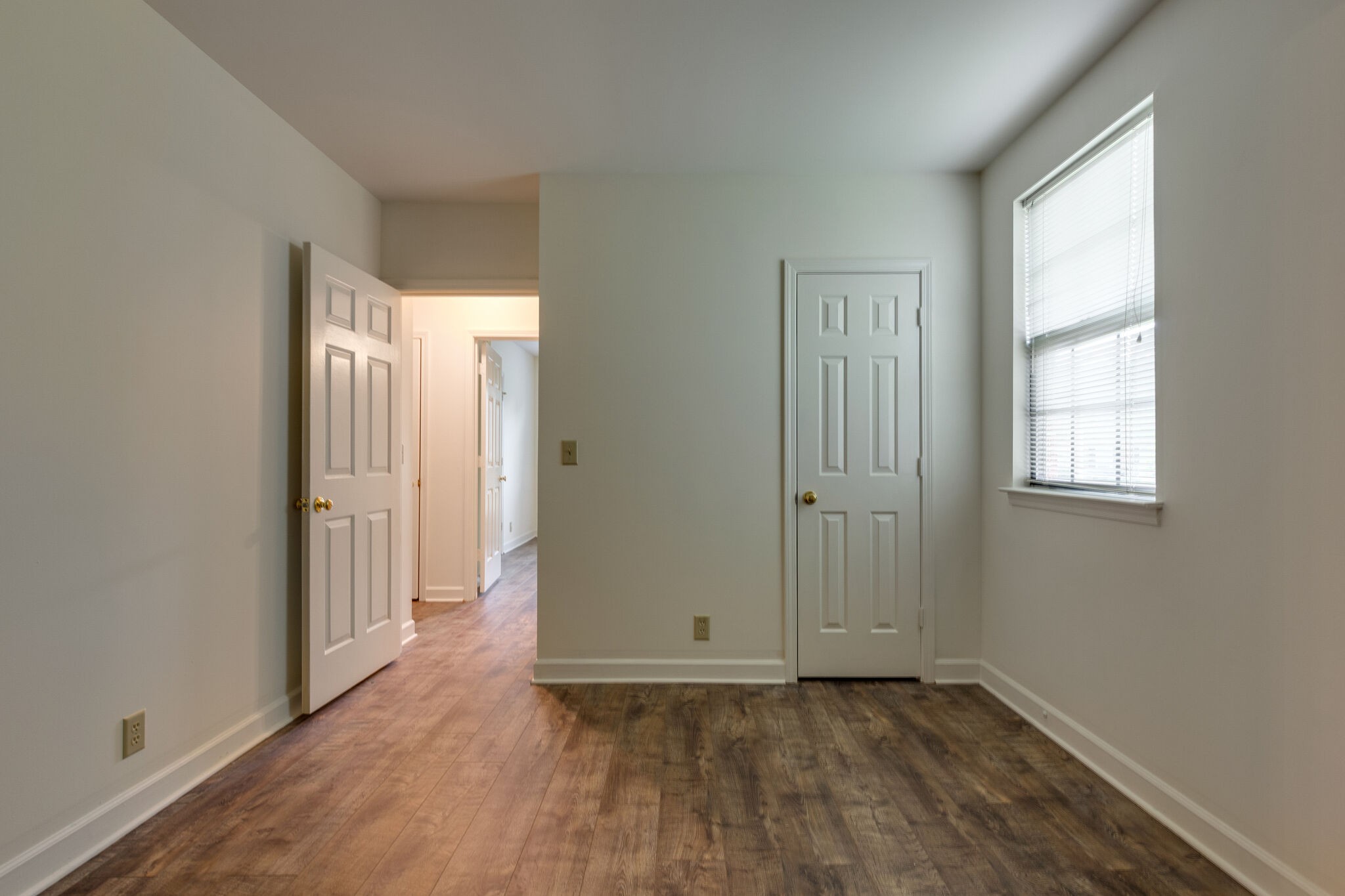712 General George Patton Road Nashville, TN 37221 - Photo 24 of 35 an empty room with wooden floor and windows
