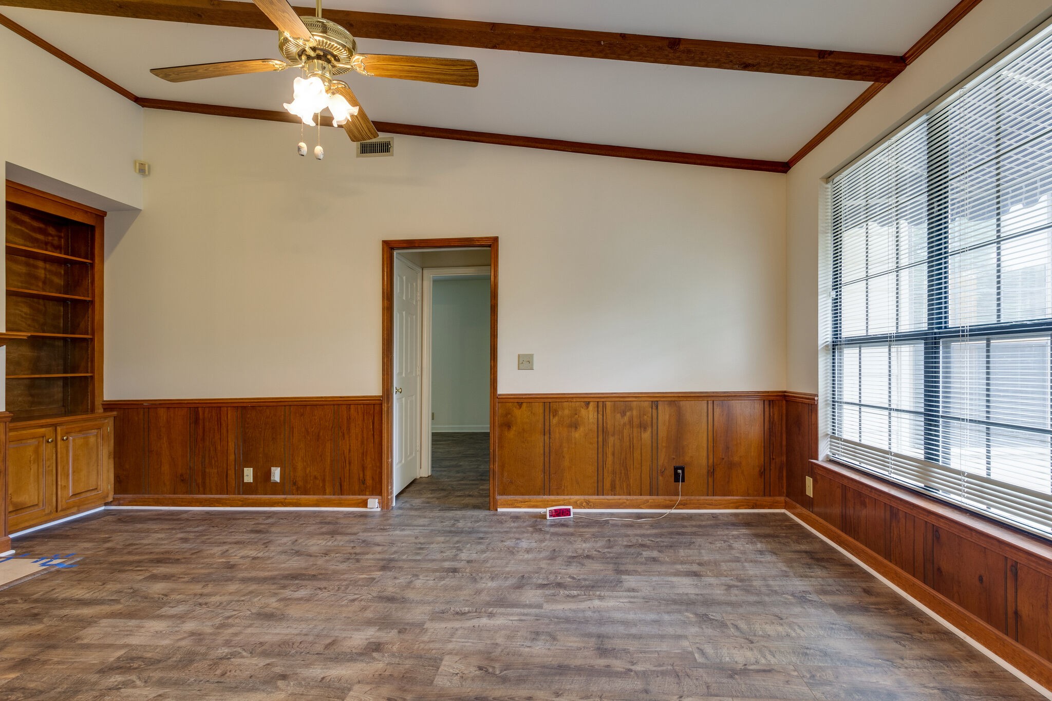 712 General George Patton Road Nashville, TN 37221 - Photo 9 of 35 an empty room with wooden floor and windows