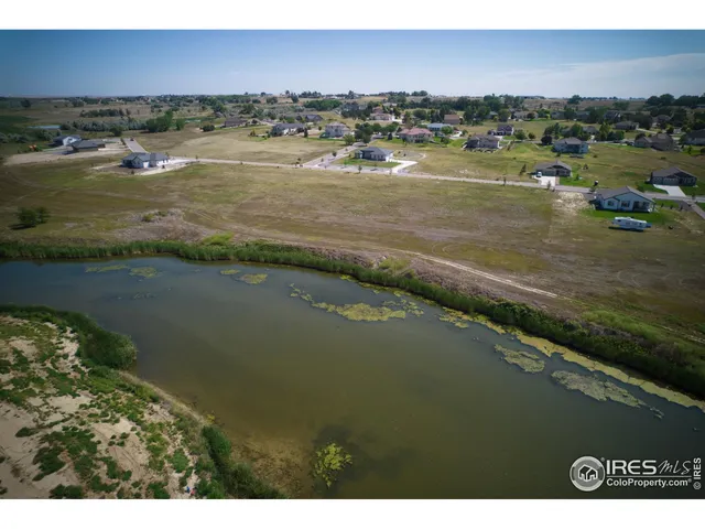 a view of an ocean and city
