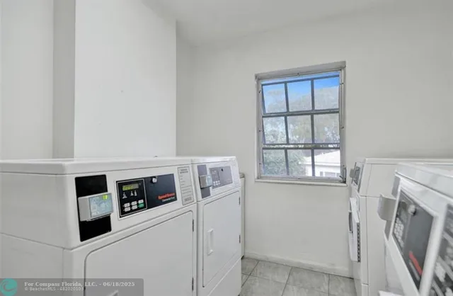a view of kitchen and washer and dryer