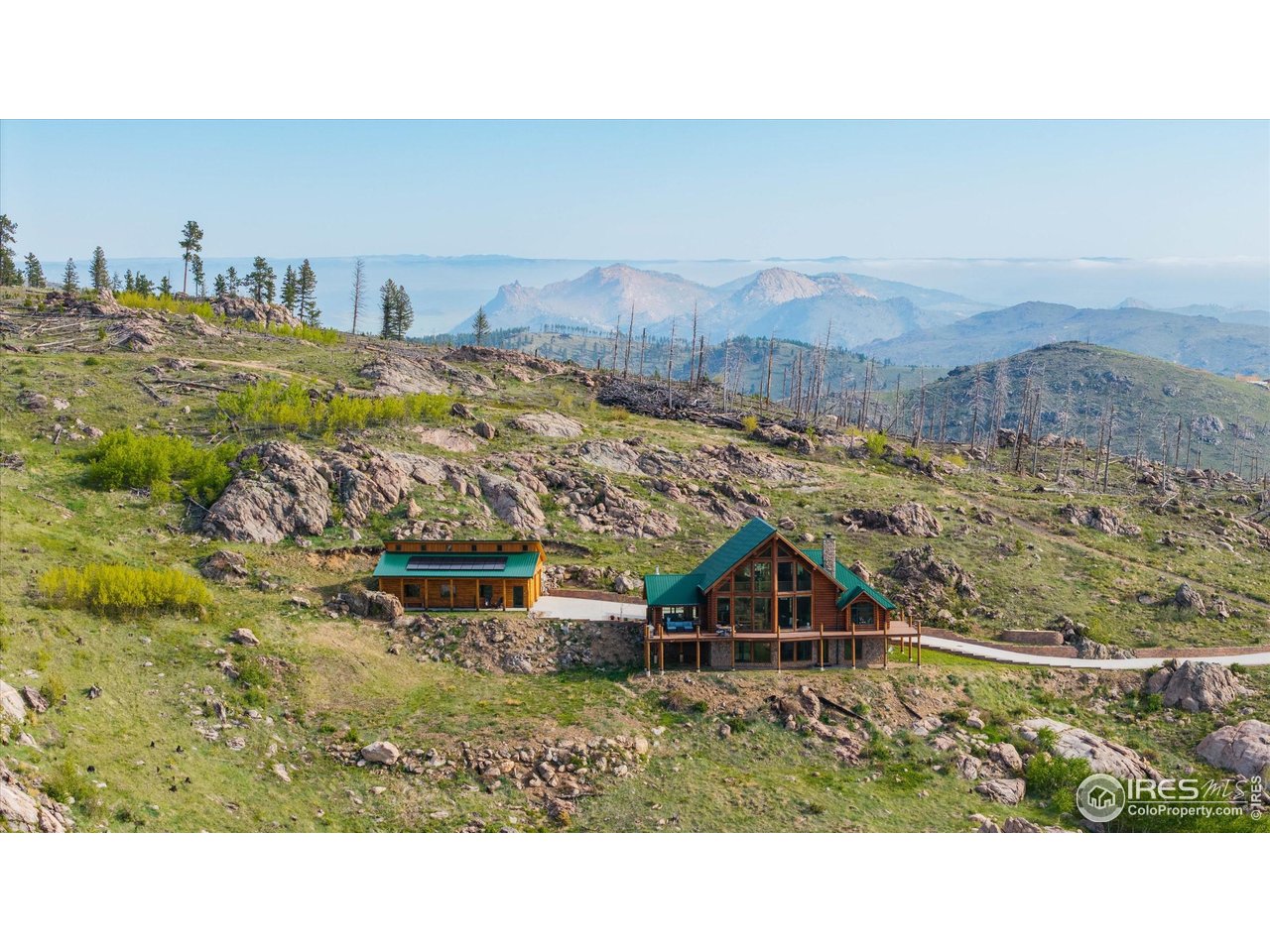 4119 Davis Ranch Road Bellvue, CO 80512 - Photo 2 of 40 a view of a house with a outdoor space
