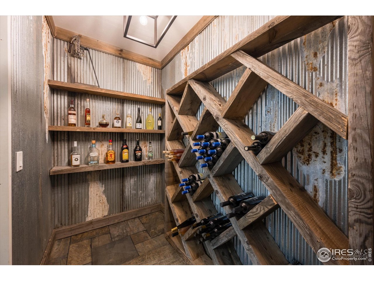 4119 Davis Ranch Road Bellvue, CO 80512 - Photo 34 of 40 a black and white building with wooden floor