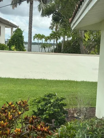 a view of a room that has a large window
