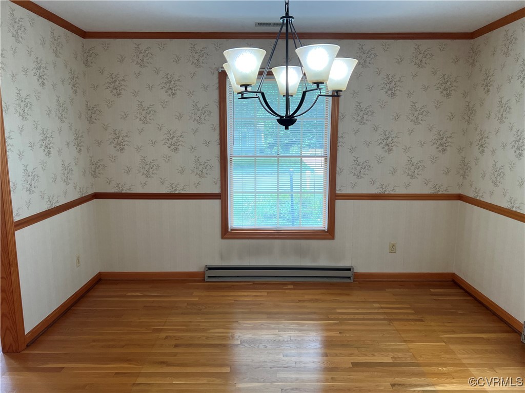8426 Forge Road Henrico, VA 23228 - Photo 15 of 46 Empty room with light wood-style floors, a baseboa