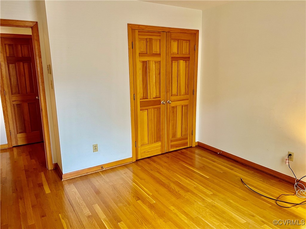 8426 Forge Road Henrico, VA 23228 - Photo 27 of 46 Unfurnished bedroom with light wood-type flooring