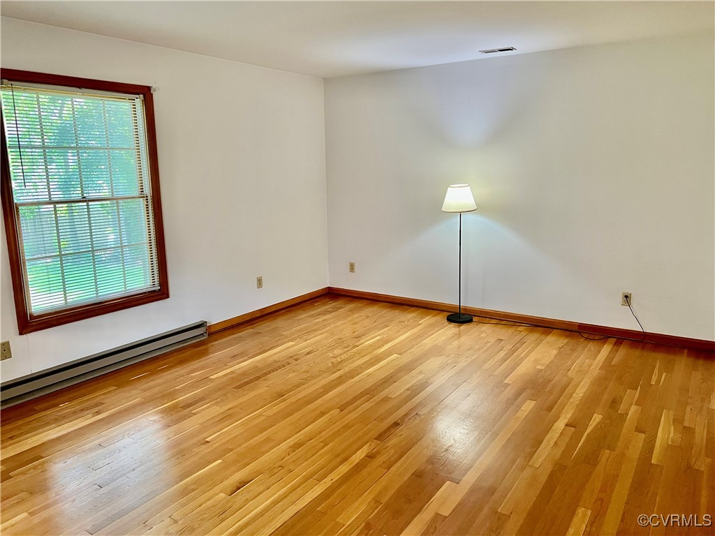 8426 Forge Road Henrico, VA 23228 - Photo 28 of 46 Unfurnished room featuring light wood-style floori