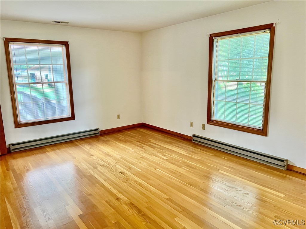8426 Forge Road Henrico, VA 23228 - Photo 29 of 46 Unfurnished room featuring a baseboard heating uni