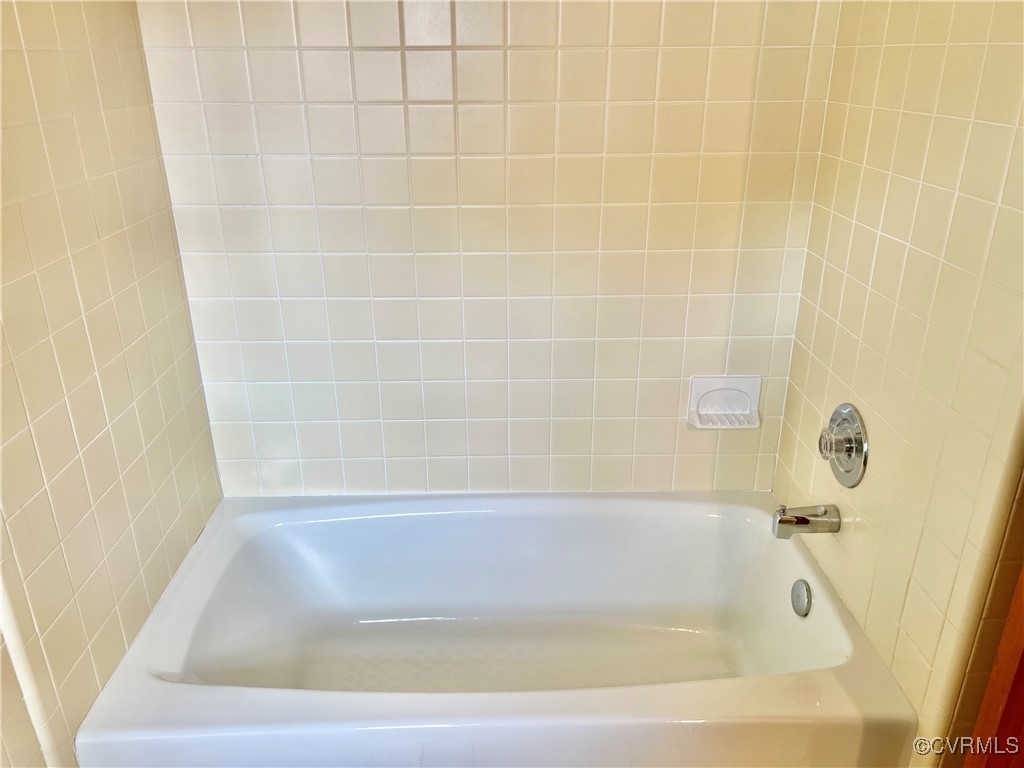 8426 Forge Road Henrico, VA 23228 - Photo 38 of 46 Bathroom featuring a tub to relax in and a shower