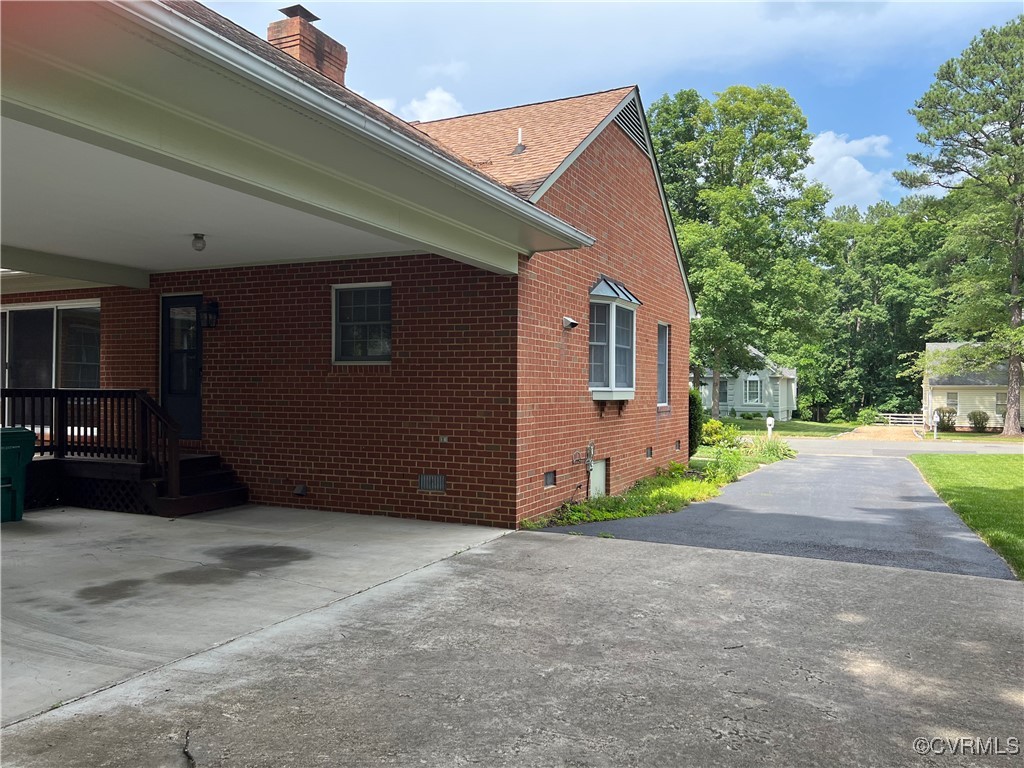 8426 Forge Road Henrico, VA 23228 - Photo 6 of 46 View of home's exterior featuring brick siding, cr