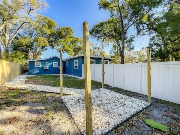 a house on the side of the road
