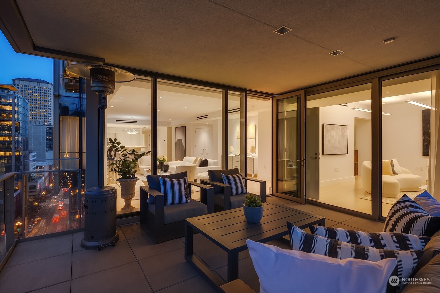 99 Union Street, Unit 1104 Seattle, WA 98101 - Photo 19 of 38 a living room with furniture and large windows