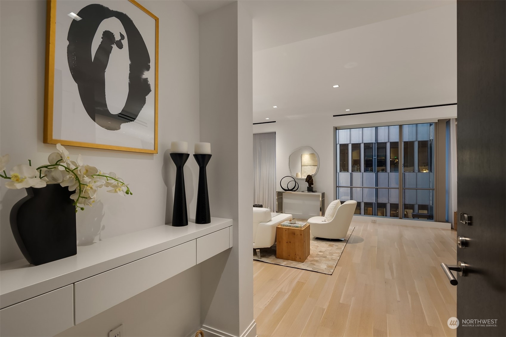 99 Union Street, Unit 1104 Seattle, WA 98101 - Photo 2 of 38 a living room with furniture