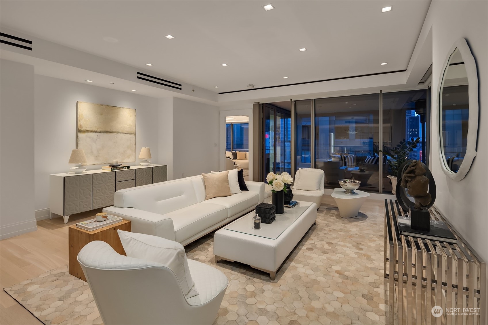 99 Union Street, Unit 1104 Seattle, WA 98101 - Photo 3 of 38 a living room with furniture and a window