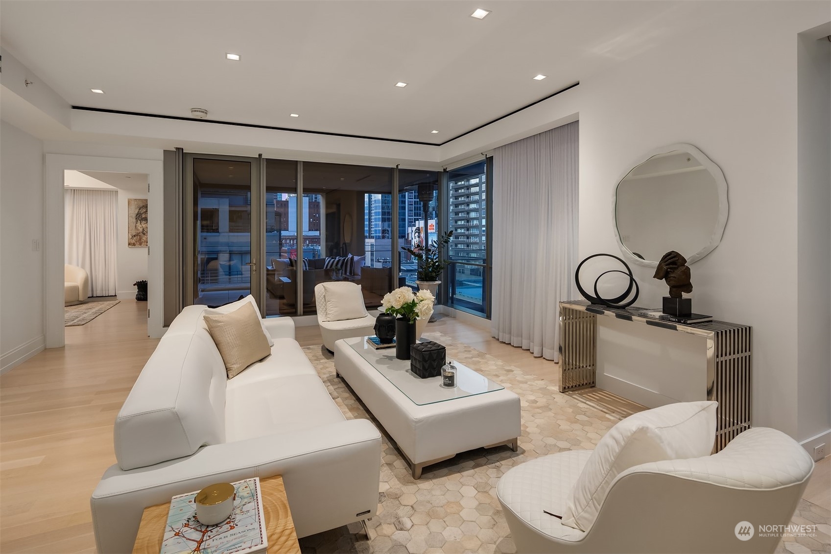 99 Union Street, Unit 1104 Seattle, WA 98101 - Photo 4 of 38 a living room with furniture and a window