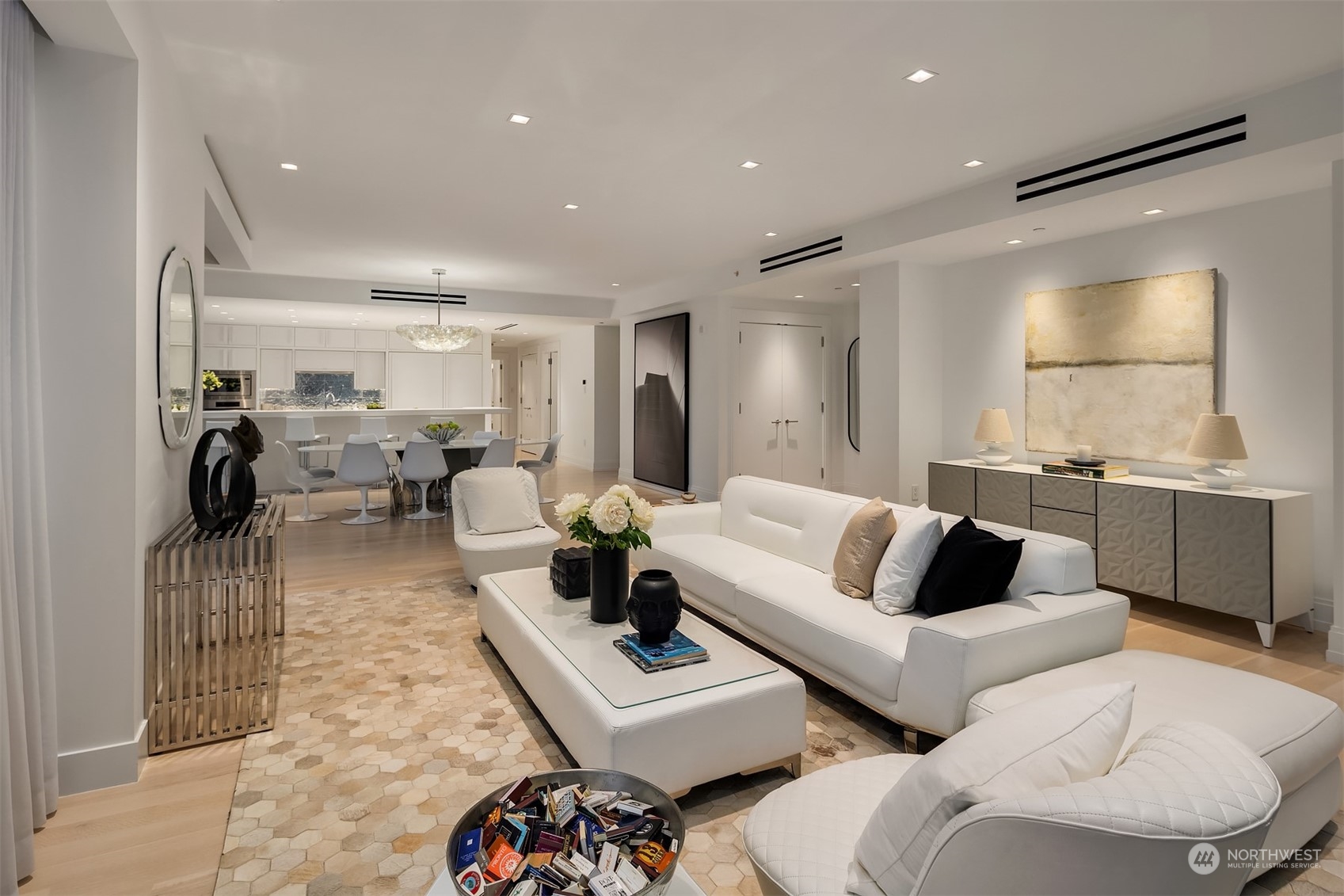 99 Union Street, Unit 1104 Seattle, WA 98101 - Photo 7 of 38 a living room with furniture and a large window
