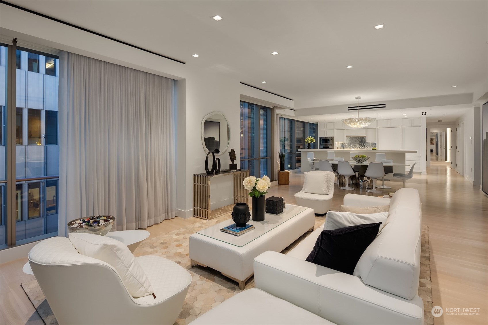 99 Union Street, Unit 1104 Seattle, WA 98101 - Photo 8 of 38 a living room with furniture and a table