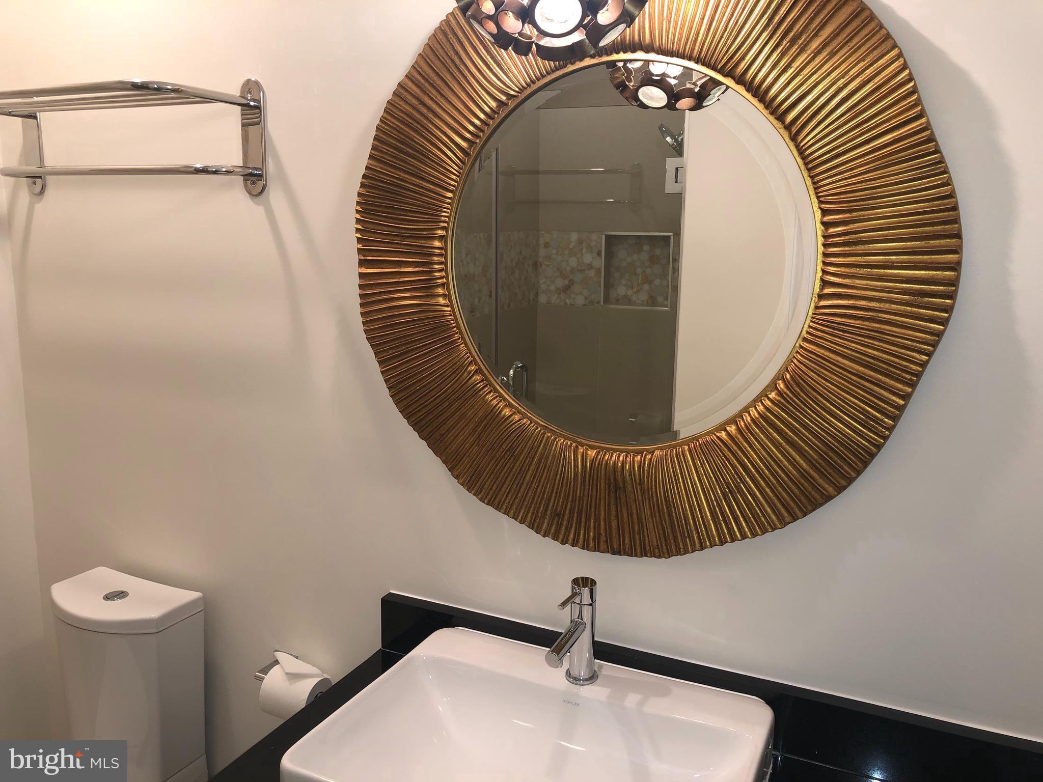 7327 Yates Court McLean, VA 22101 - Photo 14 of 34 Updated full bathrooms on main and lower levels