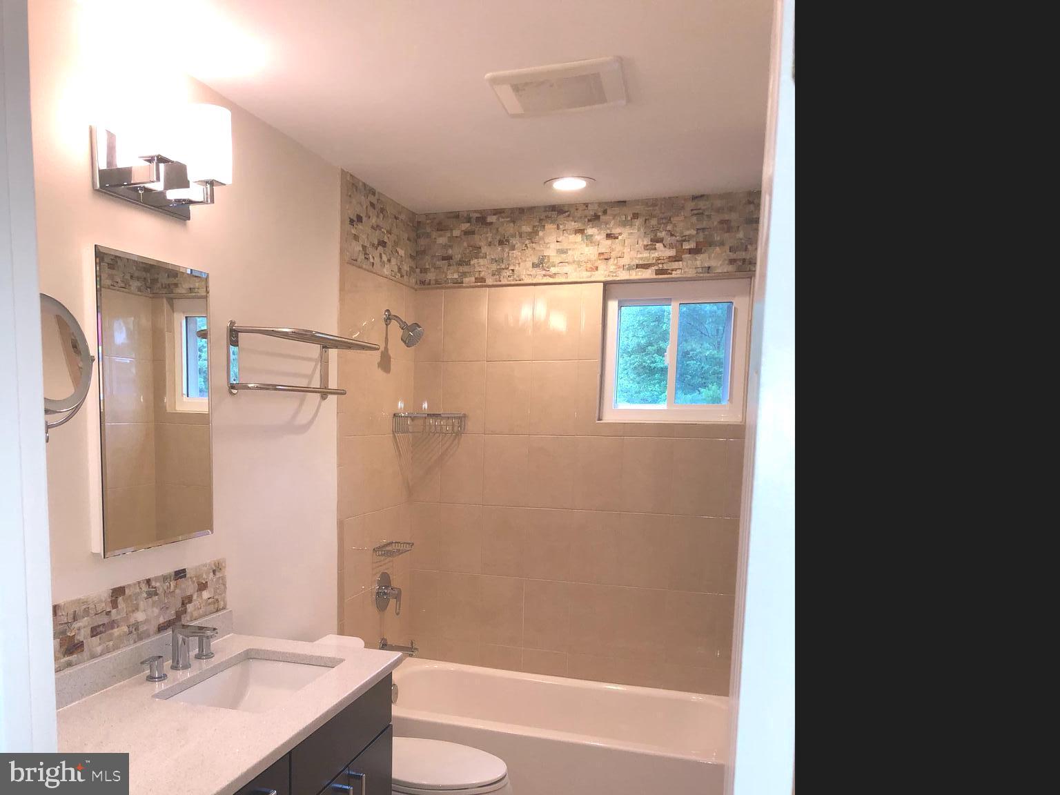 7327 Yates Court McLean, VA 22101 - Photo 20 of 34 Renovated full hall Bathroom with two sinks