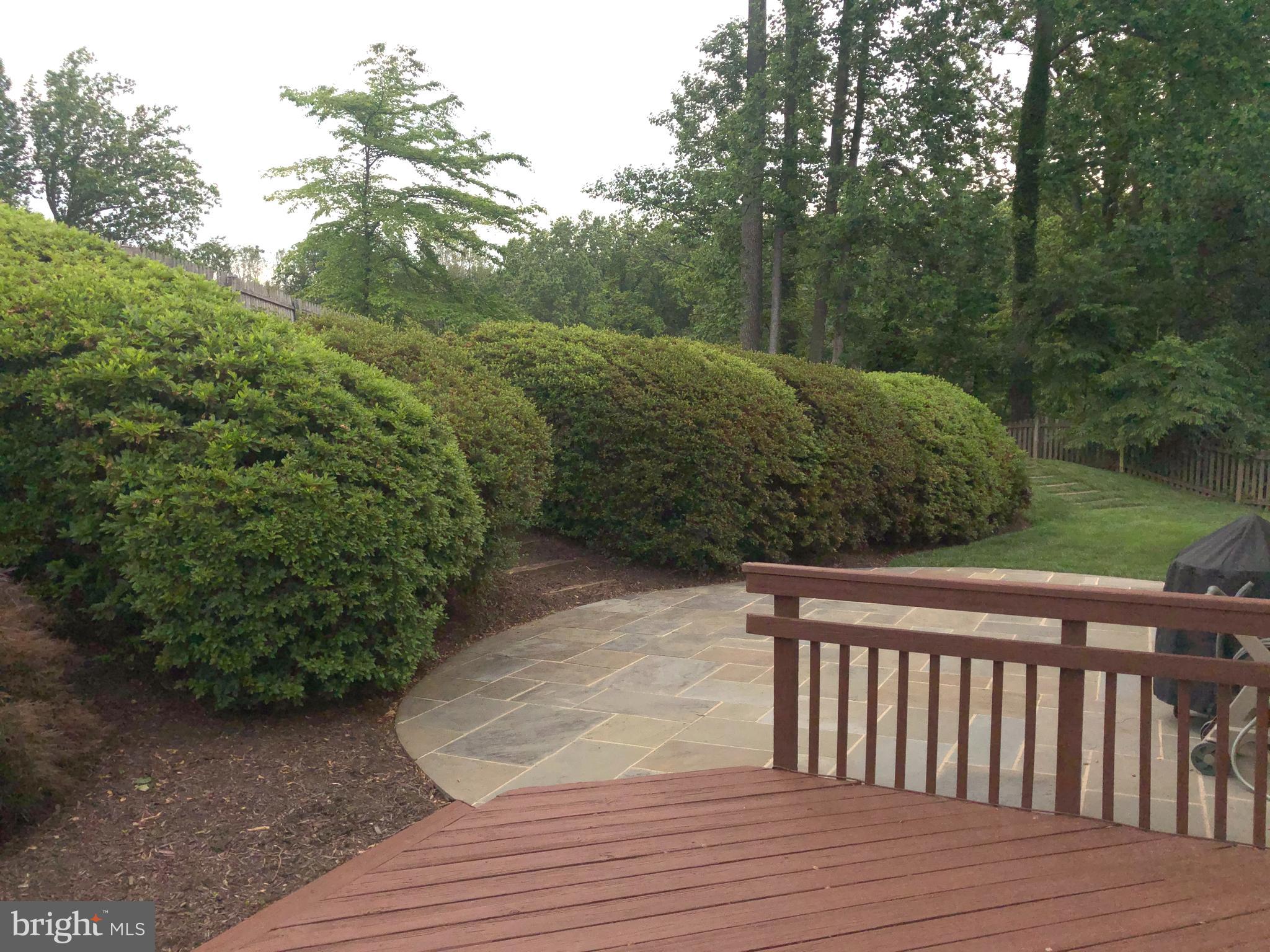 7327 Yates Court McLean, VA 22101 - Photo 32 of 34 Back deck and stone patio