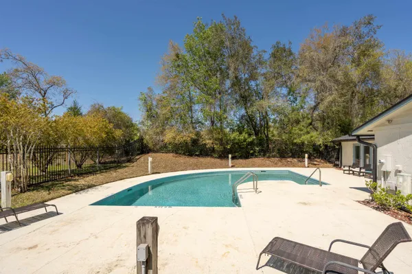 a view of a backyard with a patio