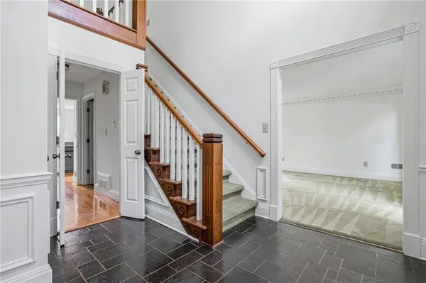 a view of an entryway with staircase