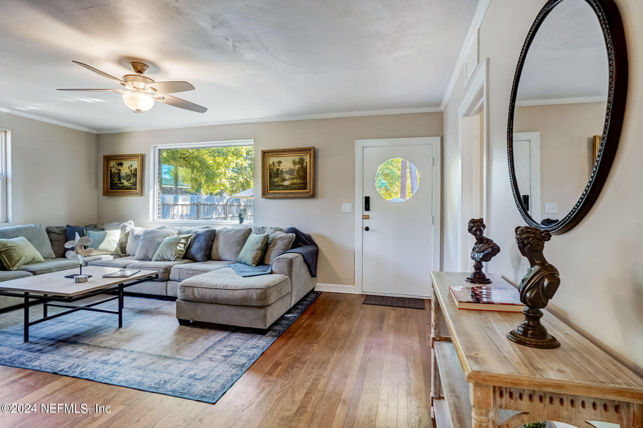 1435 Monticello Road Jacksonville, FL 32207 - Photo 12 of 33 a living room with furniture and a wooden floor