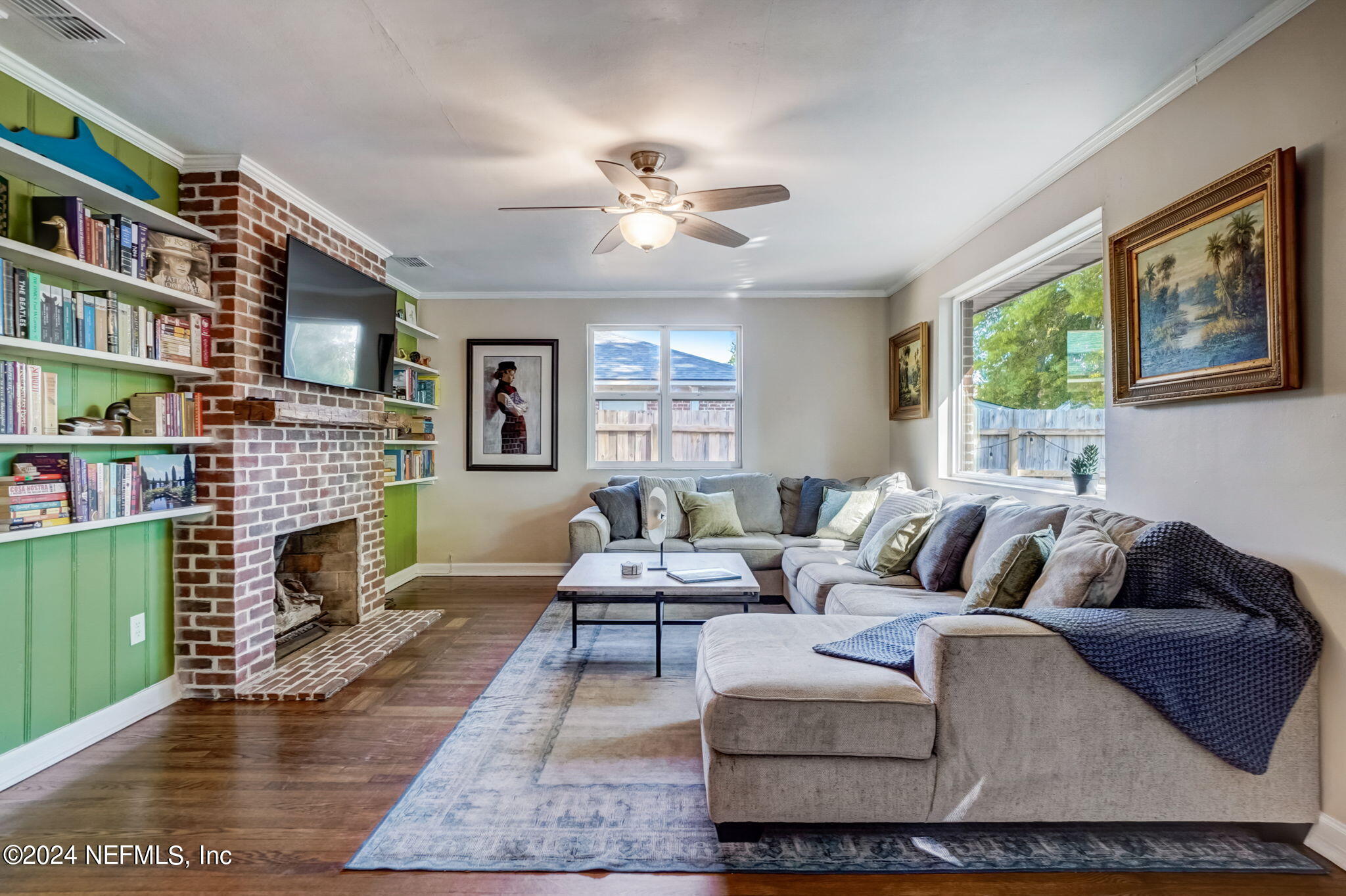 1435 Monticello Road Jacksonville, FL 32207 - Photo 13 of 33 a living room with furniture and a fireplace