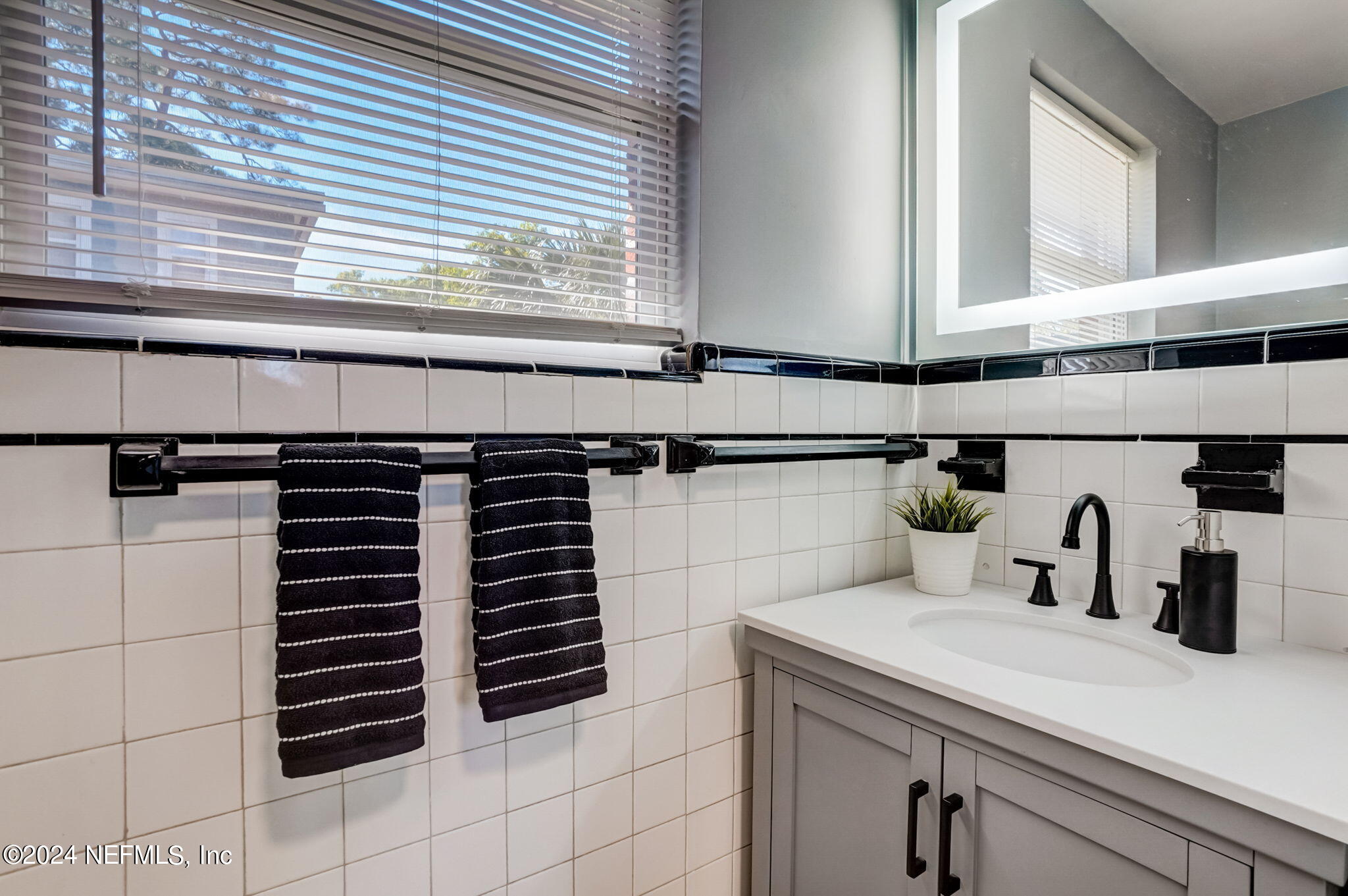 1435 Monticello Road Jacksonville, FL 32207 - Photo 22 of 33 a kitchen with a sink and a window