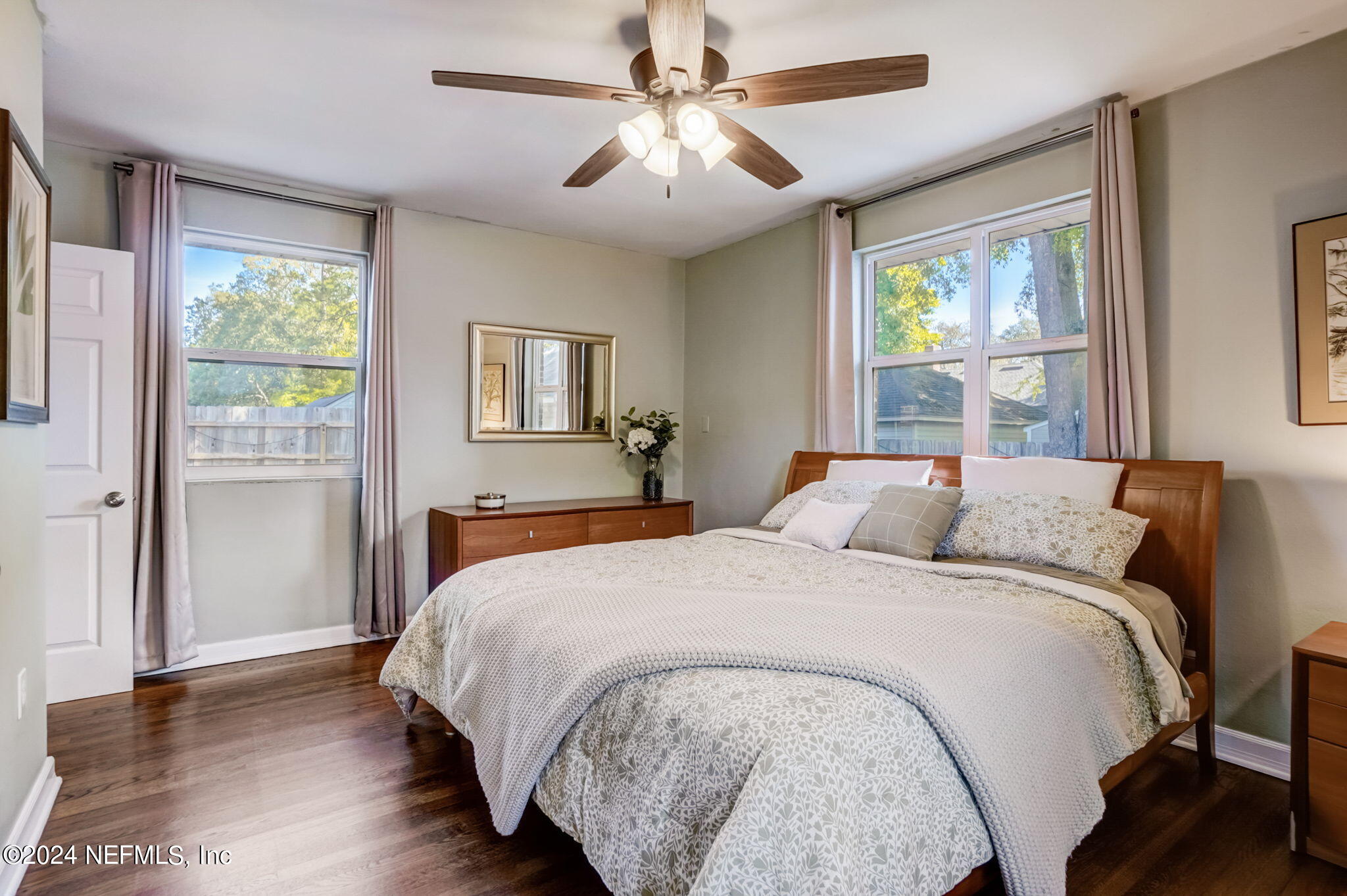 1435 Monticello Road Jacksonville, FL 32207 - Photo 24 of 33 a bed sitting in a bedroom next to a window