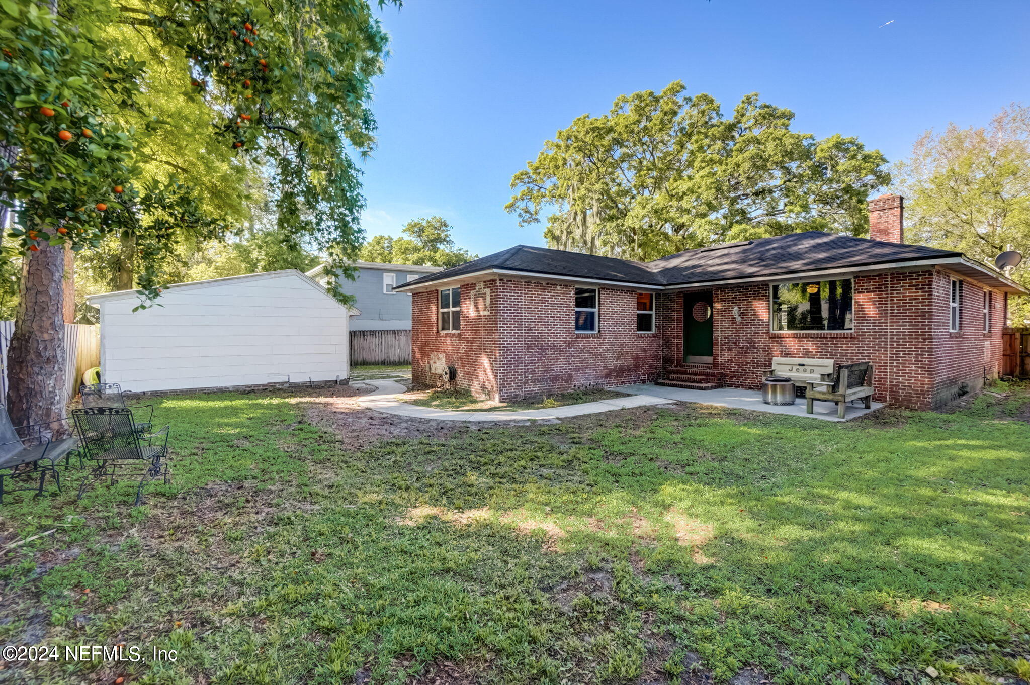 1435 Monticello Road Jacksonville, FL 32207 - Photo 27 of 33 a front view of a house with garden