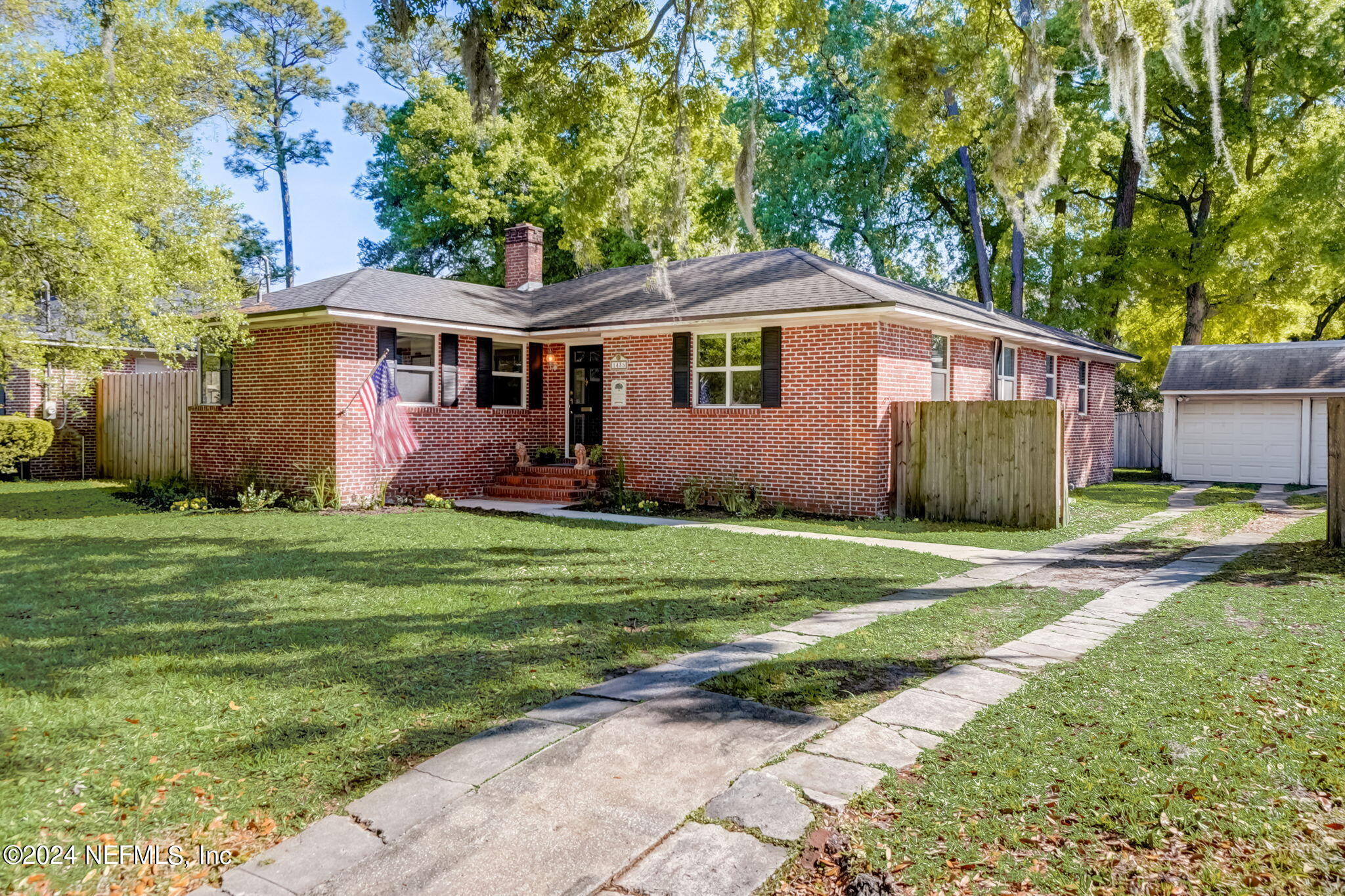 1435 Monticello Road Jacksonville, FL 32207 - Photo 3 of 33 a front view of a house with garden
