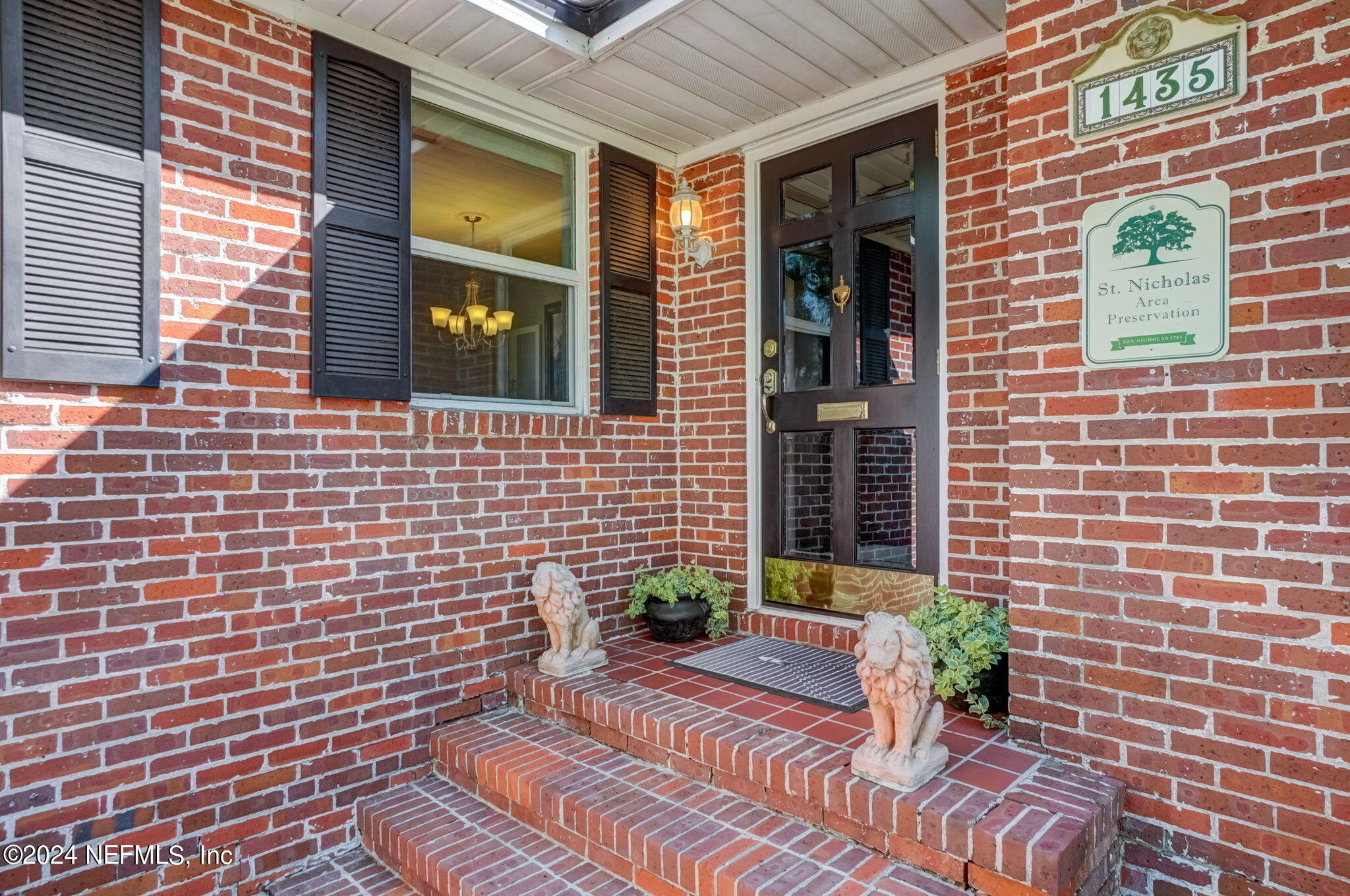 1435 Monticello Road Jacksonville, FL 32207 - Photo 5 of 33 a view of a brick wall of the house