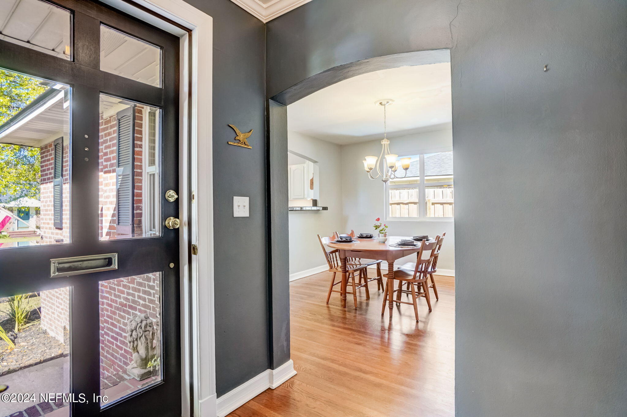 1435 Monticello Road Jacksonville, FL 32207 - Photo 6 of 33 a dining room with furniture and wooden floor