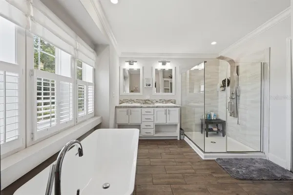a view of cabinets with washer and dryer