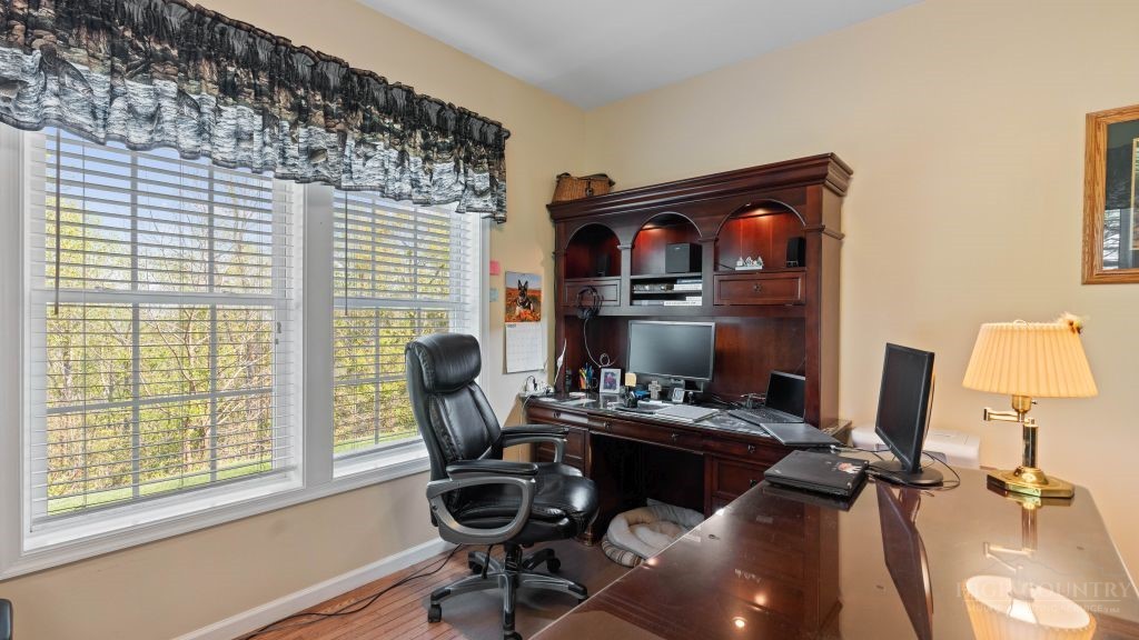713 Kalmia Lane Boone, NC 28607 - Photo 11 of 50 a work room with furniture and a window
