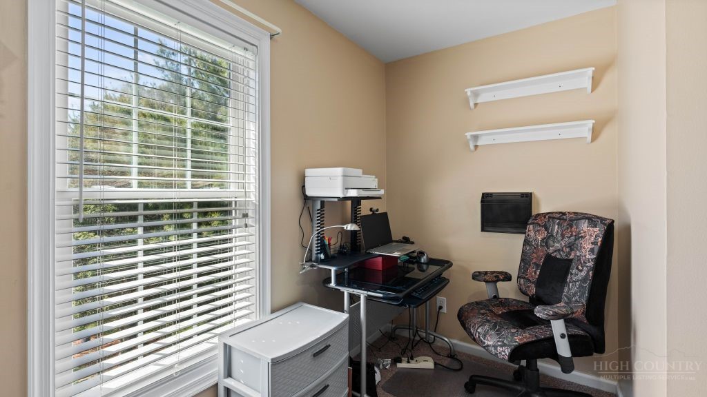 713 Kalmia Lane Boone, NC 28607 - Photo 17 of 50 a workspace with furniture and a window